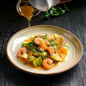 Le vinaigre à la pulpe de fruit de la passion donnera un supplément de saveur à de nombreuses préparations.